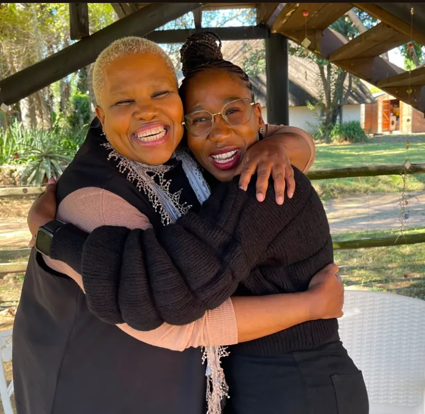 Founder embracing a woman in the Gamechangers sisterhood